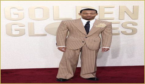 Tyler James Williams Dons Pin-striped Suit at Golden Globes 2024